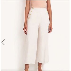 Tan work pants. Cropped